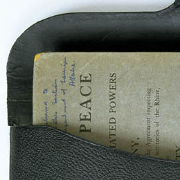 Detail of the black leather satchel containing Australia's copy of the Treaty of Versailles.