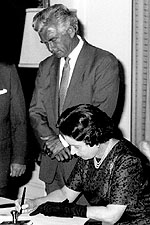 Queen Elizabeth II signs her Assent to the Australia Act.